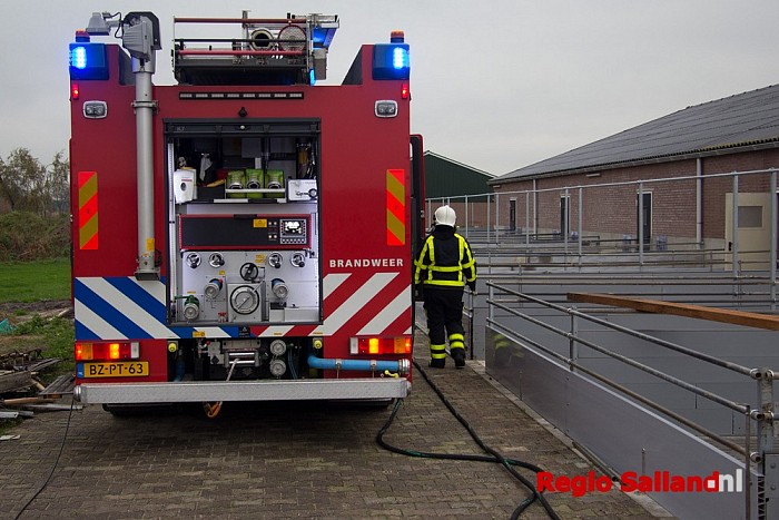 Brand in schuur snel geblust door bewoners in Lemelerveld - Foto: Pim Haarsma