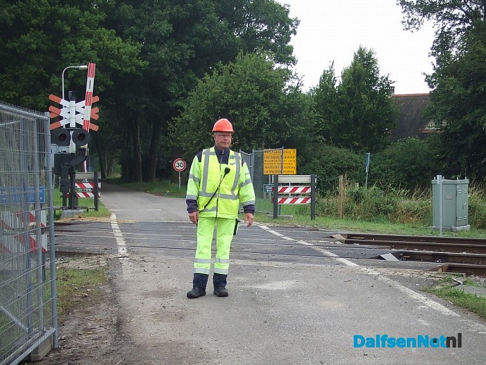 Werkzaamheden aan het spoor met groot materieel.