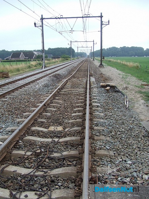 Werkzaamheden aan het spoor met groot materieel.
