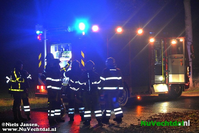 Auto in de brand na ongeval - Foto: Niels Jansen