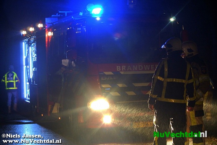 Auto in de brand na ongeval - Foto: Niels Jansen