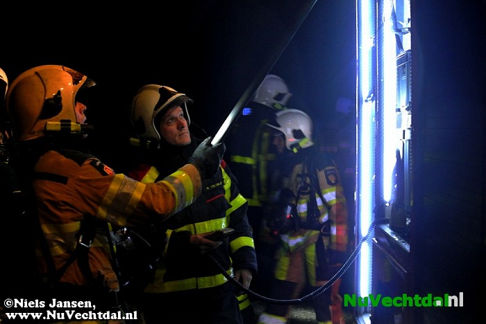 Auto in de brand na ongeval - Foto: Niels Jansen