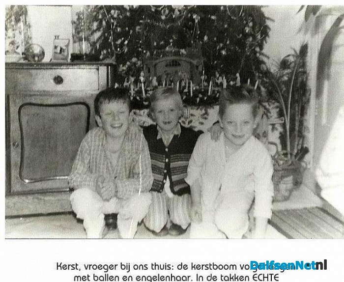 Met echte kaarsjes in de takken