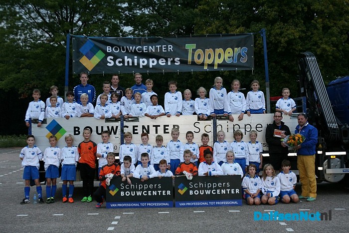 Op de foto met de sponsor