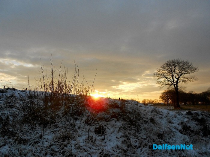 Zon en zonsondergang
