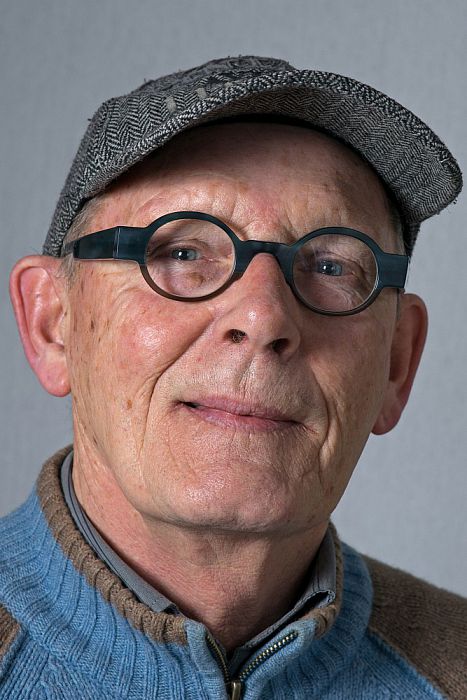 Man met hoofddeksel Flip Huisman - Foto: Paul Scholten