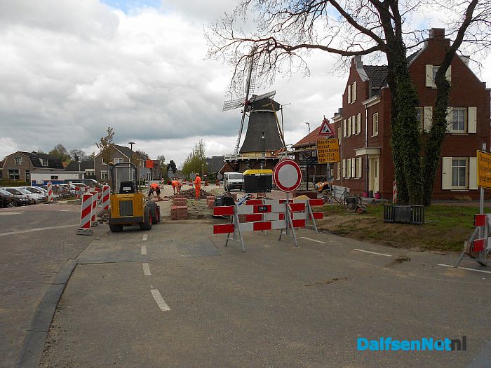 De straat ligt er weer bijna in