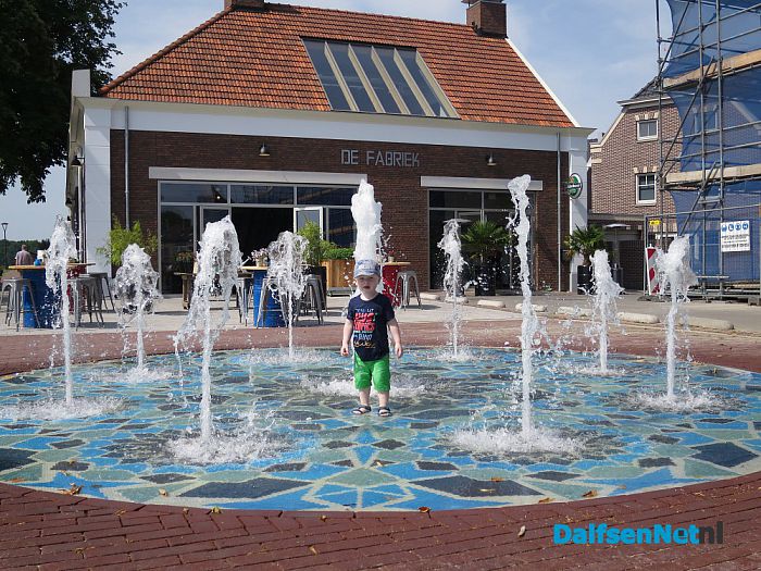 Genieten met een nat pak - Foto: Wim