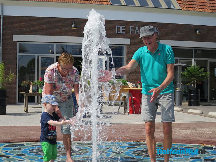 Genieten met een nat pak - Foto: Wim