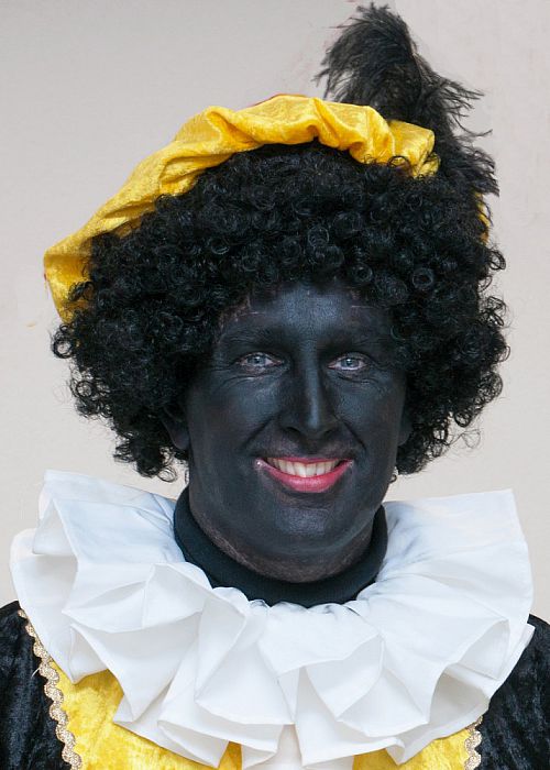 Man met hoofddeksel: deze keer Zwarte Piet - Foto: Paul Scholten