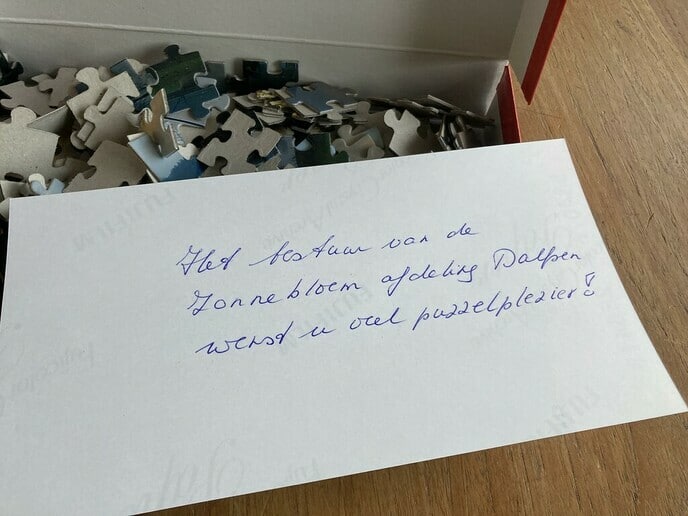 De Zonnebloem verrast gasten en vrijwilligers met een legpuzzel - Foto: Eigen geleverde foto