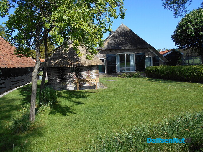 Bord met naam van de boerderij