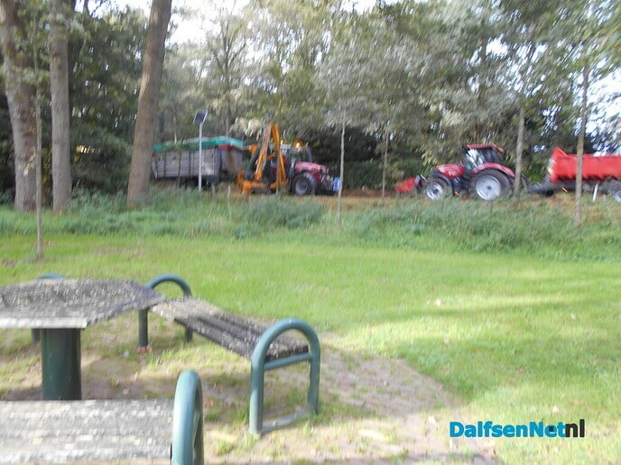 Optocht van grasmaaiers