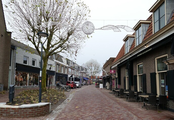 Van modderweg naar klimaatwinkelstraat - Foto: Ingezonden foto