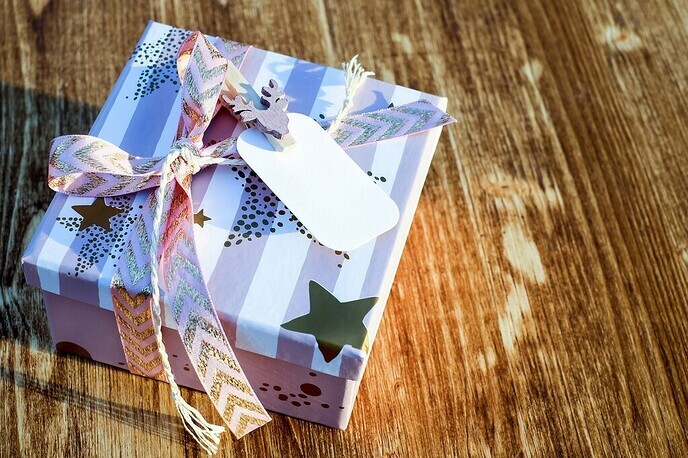 Kerstpakketten 2024: lokale & gepersonaliseerde cadeaus scoren goed