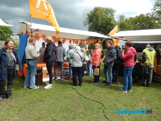 Stralende momenten op de boerenmarkt tijdens een zonnige ochtend - Foto: Willy
