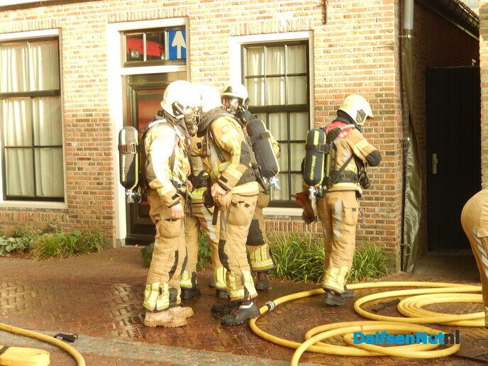 Veel rook uit voormalig Chinees restaurant aan Kerkplein - Foto: Willy
