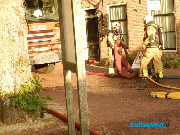 Veel rook uit voormalig Chinees restaurant aan Kerkplein - Foto: Willy