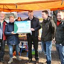 Groen Gebogen ontvangt startcheque.