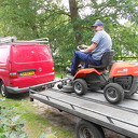 Hoogseizoen voor de grasmaaireperateur Hoogseizoen voor de grasmaaireperateur